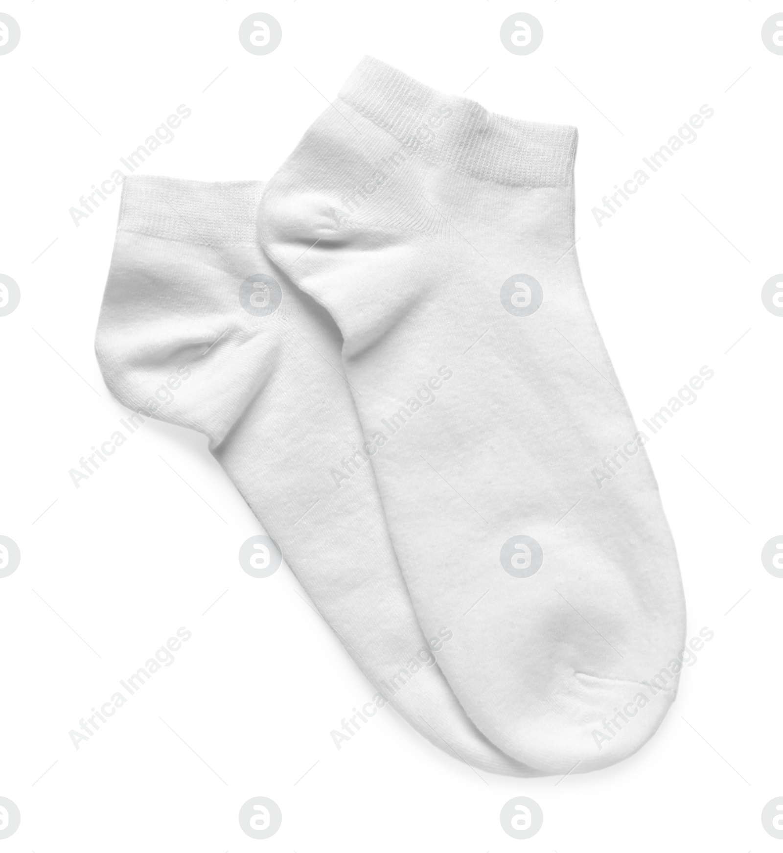 Photo of Pair of socks isolated on white, top view