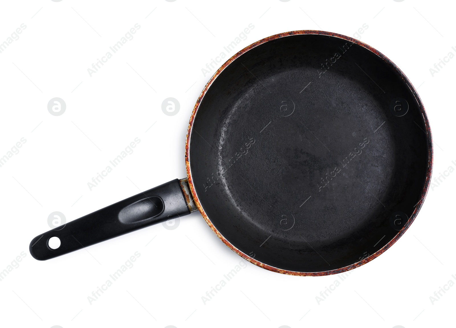 Photo of Dirty old frying pan on white background, top view