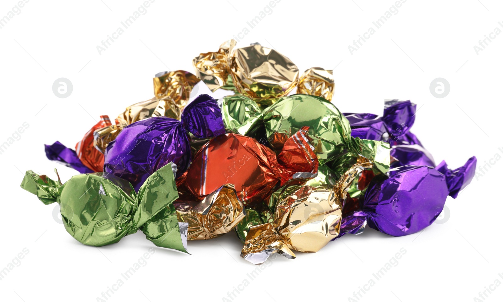 Photo of Candies in colorful wrappers isolated on white