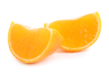 Cut fresh juicy tangerine isolated on white