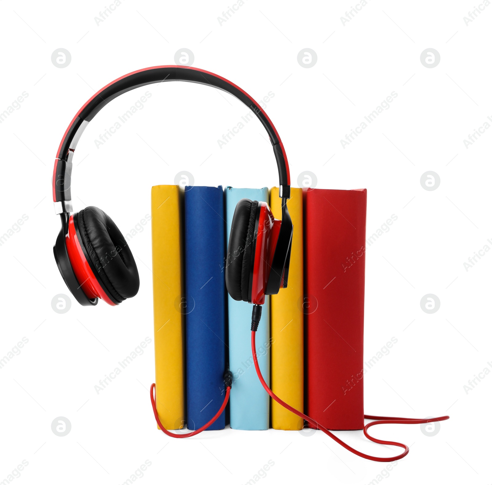 Photo of Books and modern headphones isolated on white