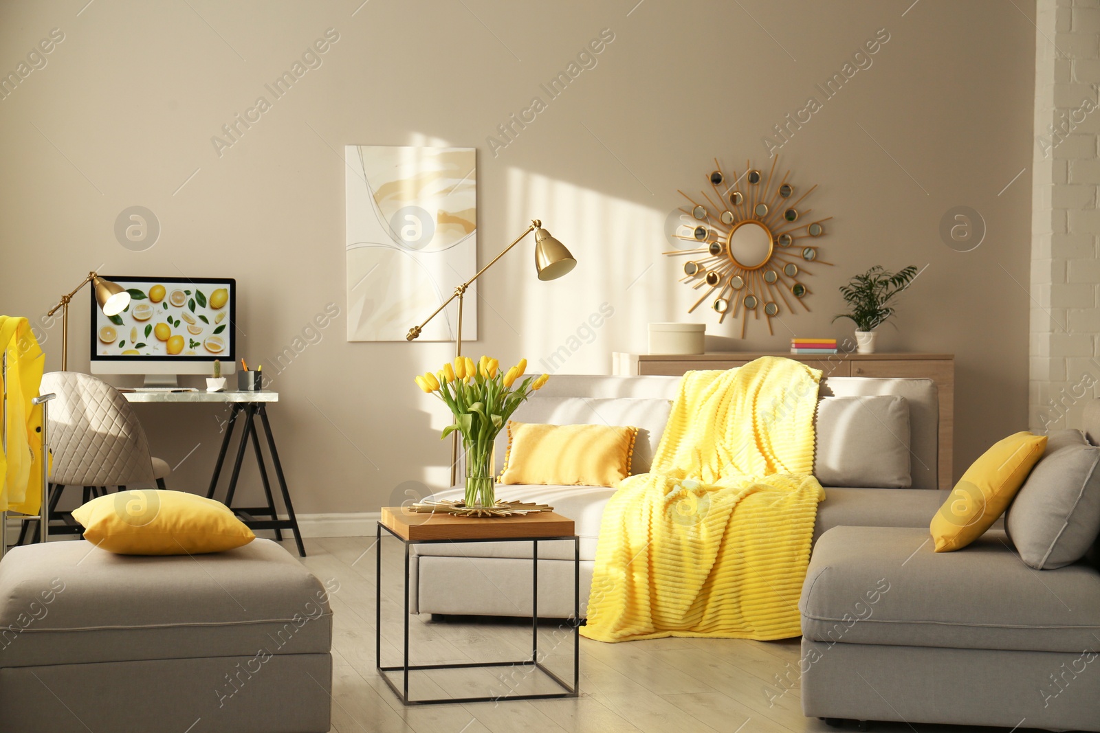 Photo of Stylish living room with sofa. Interior design in grey and yellow colors