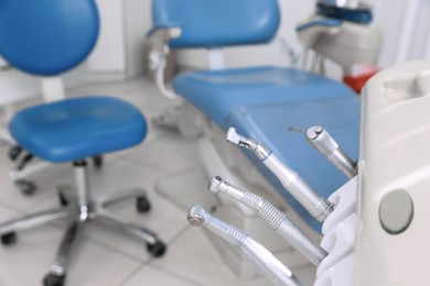 Set of professional equipment in dentist's office, space for text