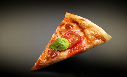Image of Slice of hot tasty pizza Margherita on dark background. Image for menu or poster
