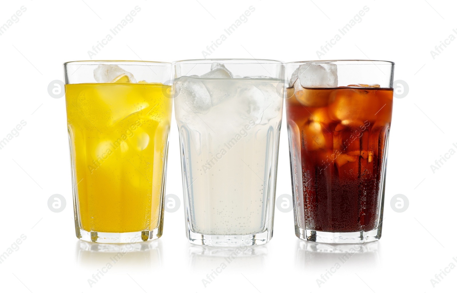 Photo of Delicious refreshing drinks in glasses on white background