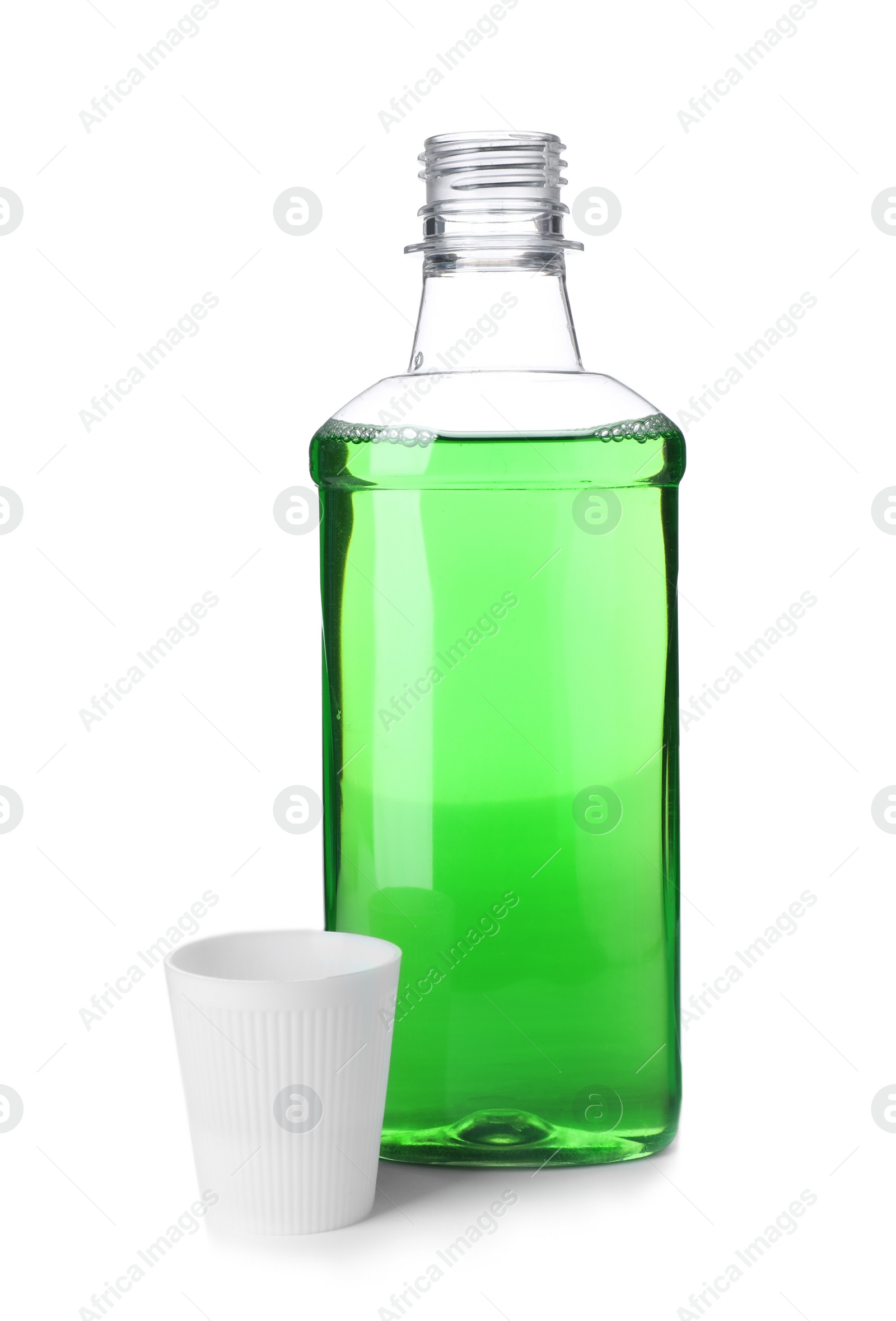 Photo of Bottle with mouthwash for teeth care on white background