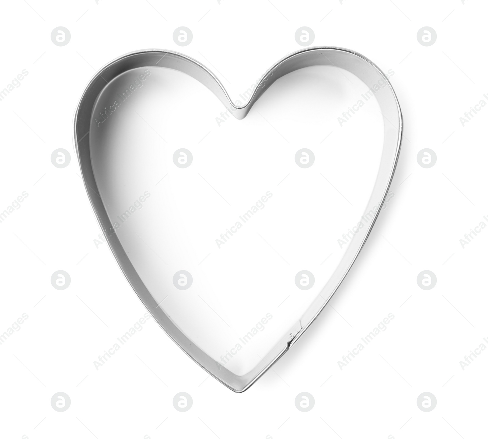 Photo of Heart shaped cookie cutter on white background, top view