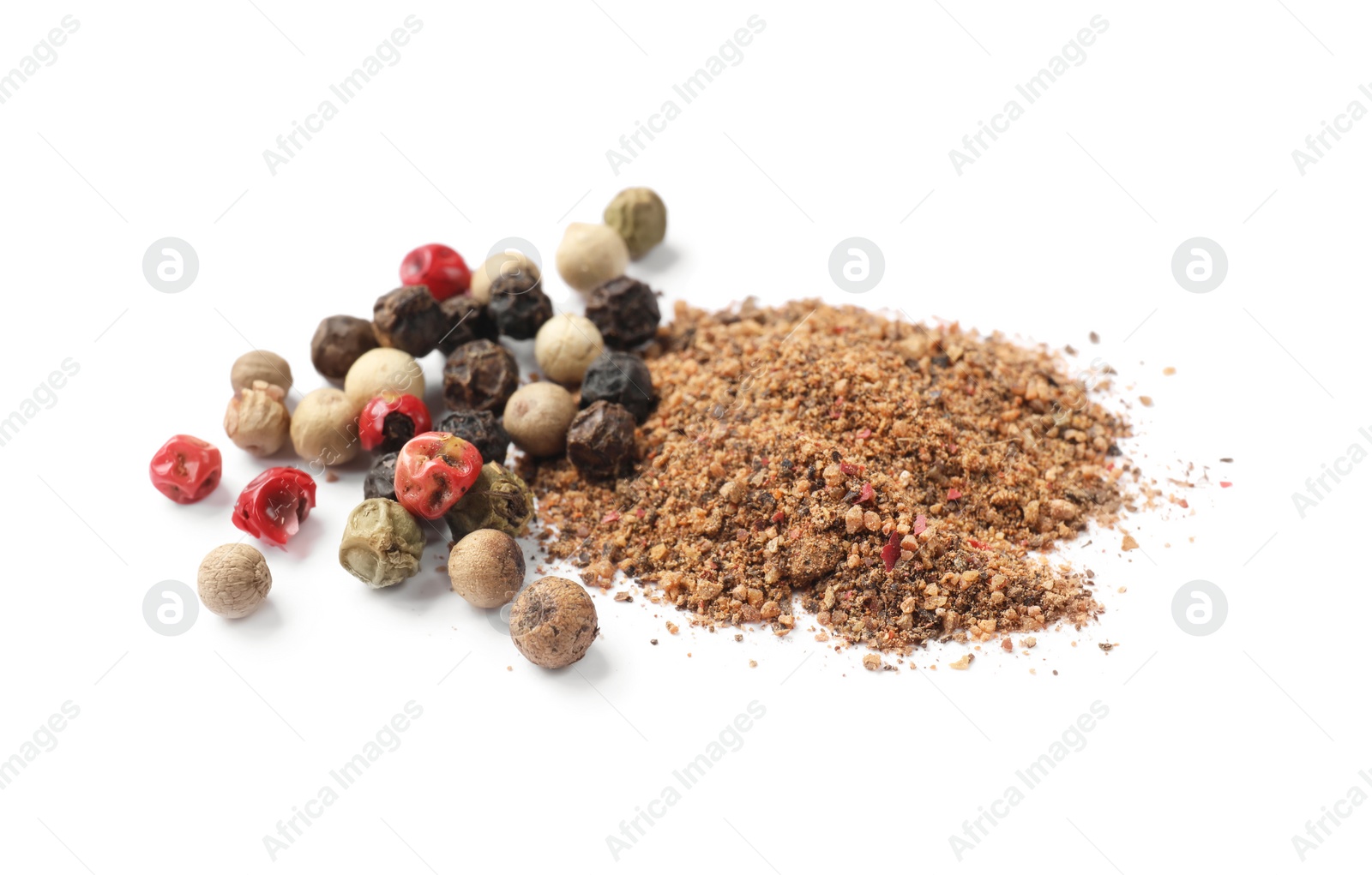 Photo of Aromatic spices. Pile of different ground and whole peppers isolated on white
