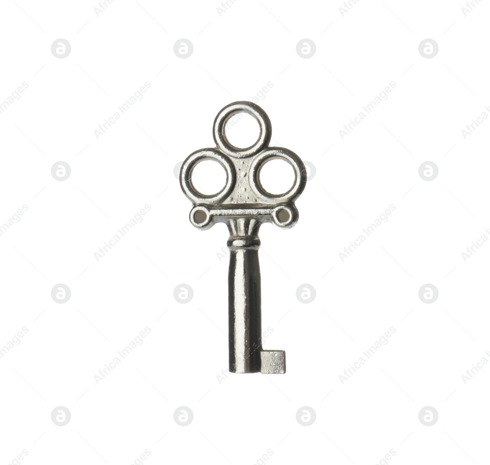 Photo of Silver vintage ornate key on white background