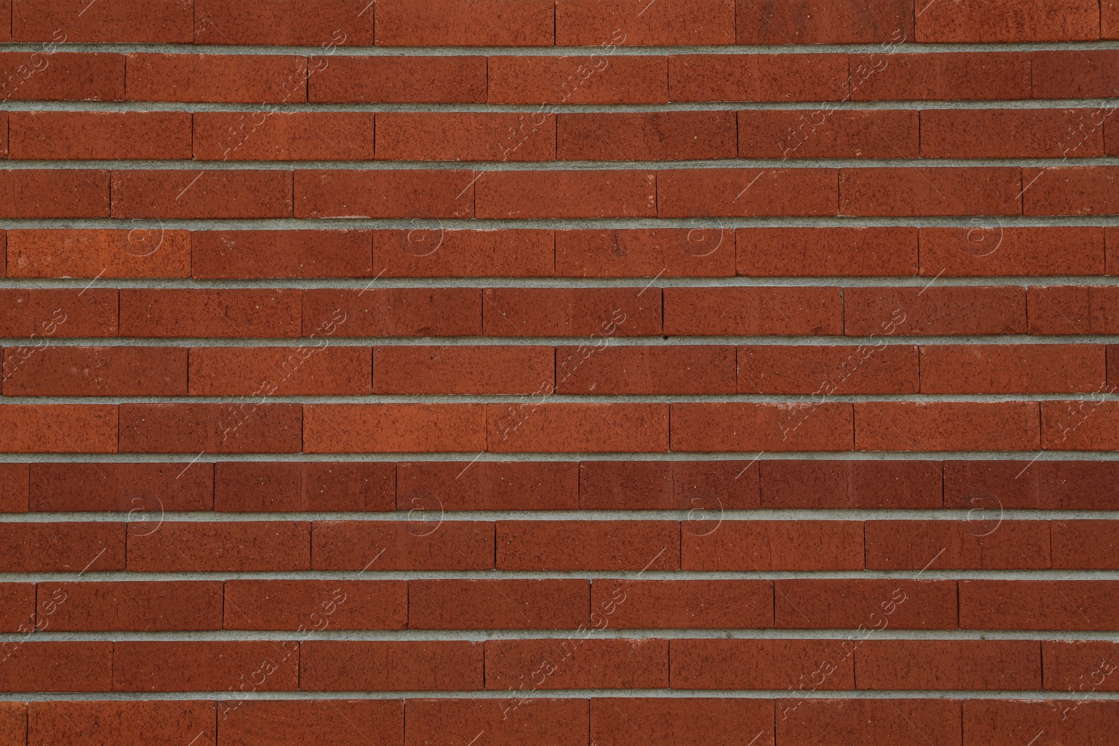 Photo of Texture of red brick wall as background