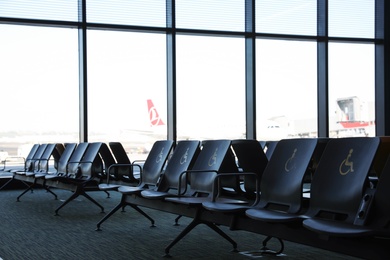 Photo of ISTANBUL, TURKEY - AUGUST 13, 2019: Waiting area with seats in new airport terminal