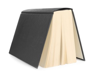 Photo of One black hardcover book isolated on white