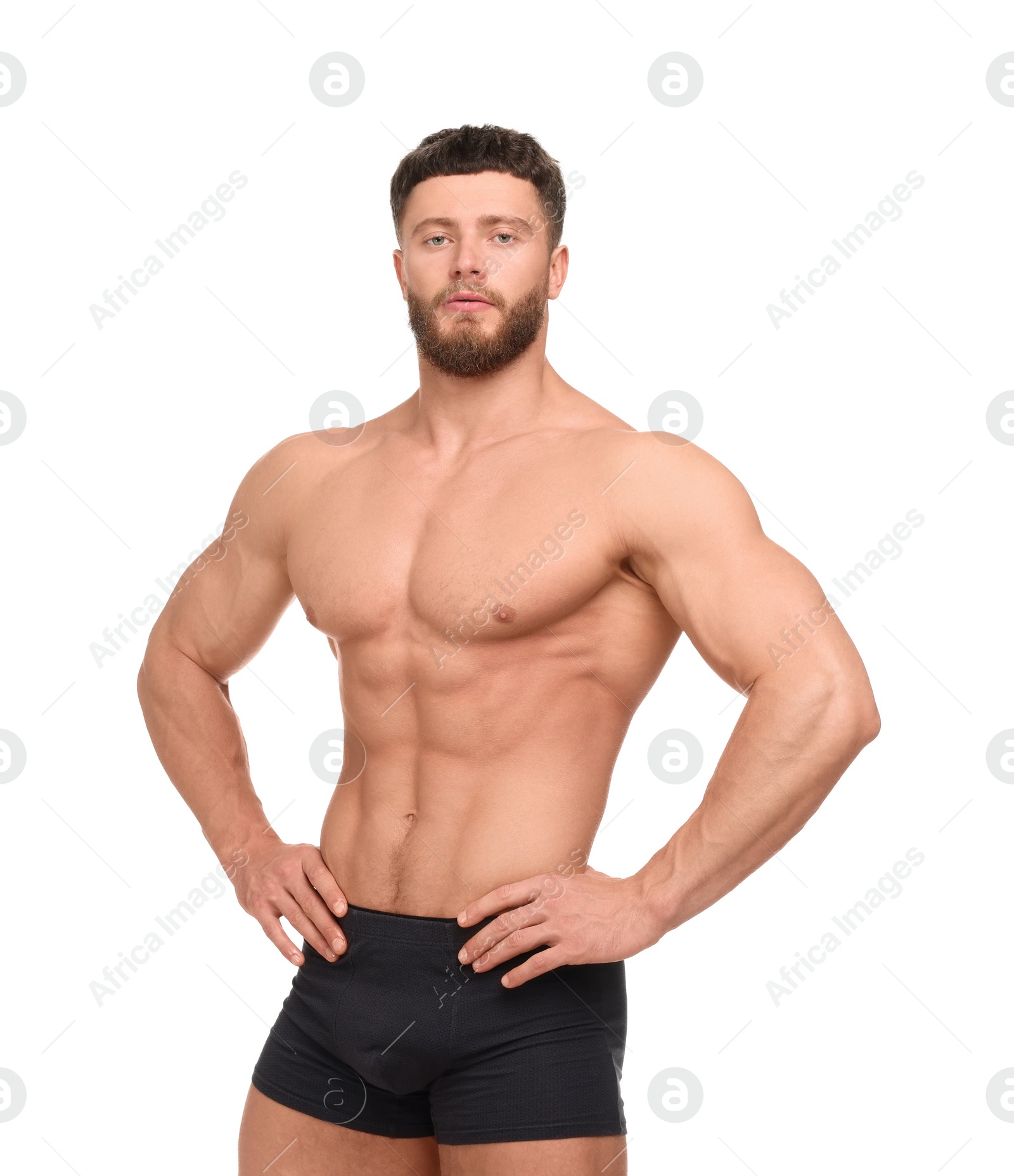 Photo of Handsome muscular man isolated on white. Sexy body