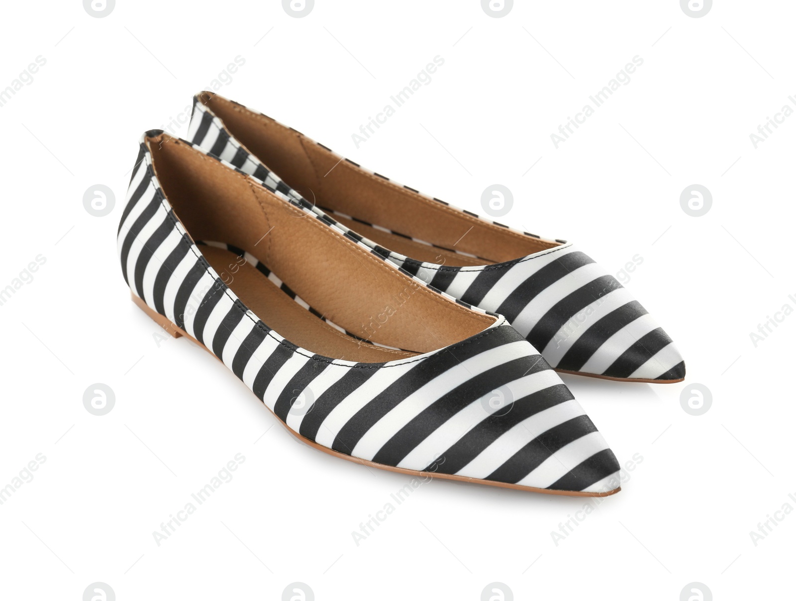 Photo of Pair of female shoes on white background