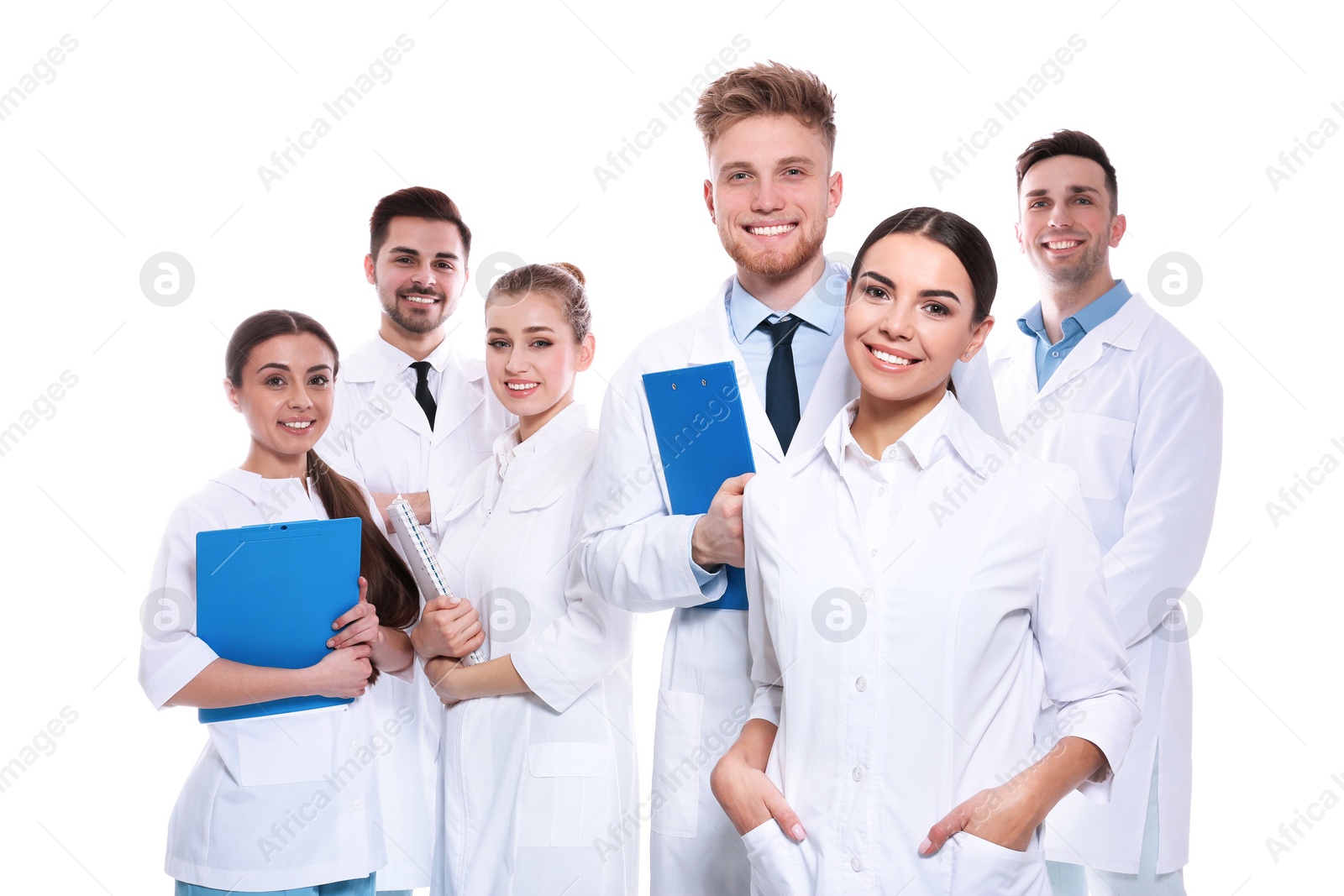 Photo of Group of medical doctors isolated on white. Unity concept