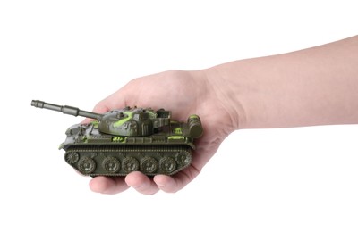 Man with toy tank on white background, closeup