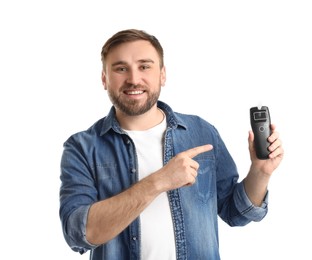 Happy man with breathalyzer on white background