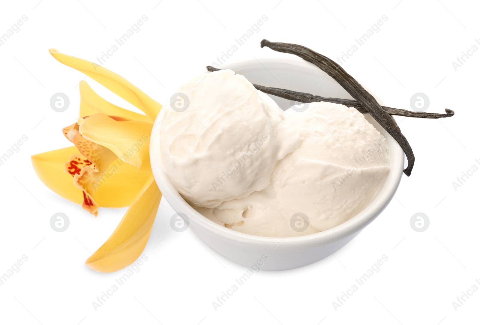 Photo of Bowl with delicious vanilla ice cream, pods and flower on white background