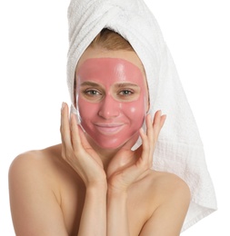 Photo of Young woman with pomegranate face mask on white background