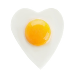 Photo of Heart shaped fried egg isolated on white, top view