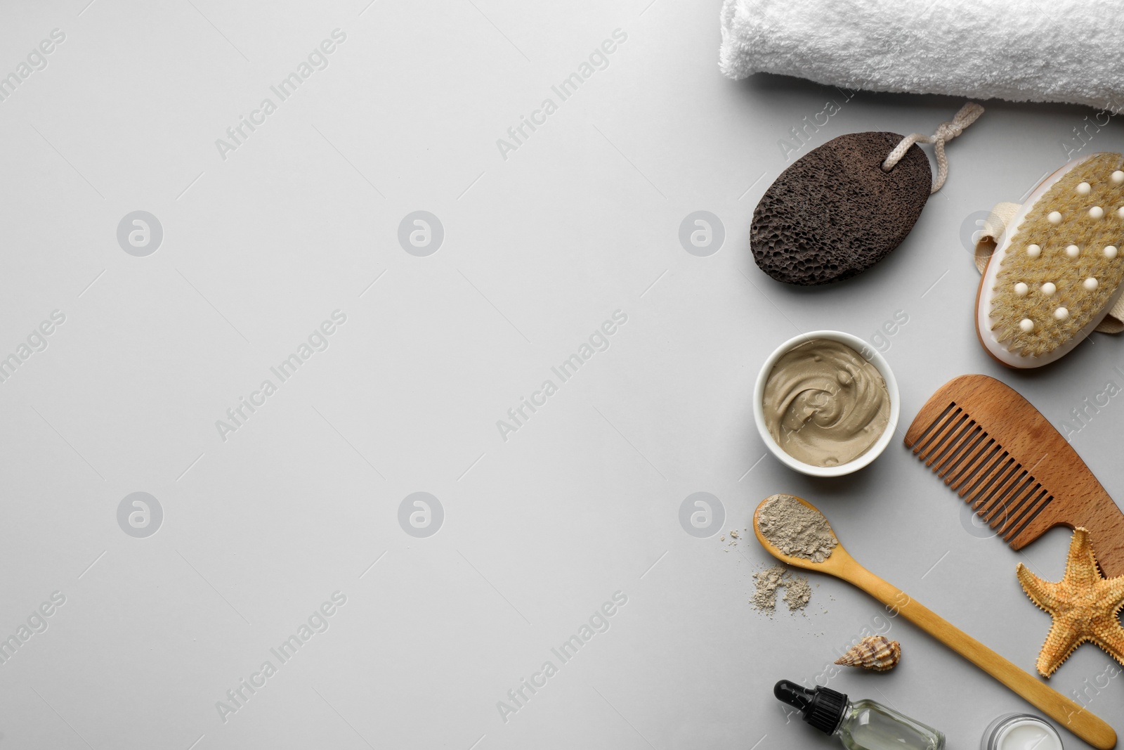 Photo of Flat lay composition with pumice stone on light grey background. Space for text