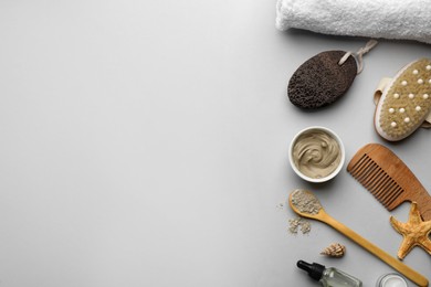 Flat lay composition with pumice stone on light grey background. Space for text