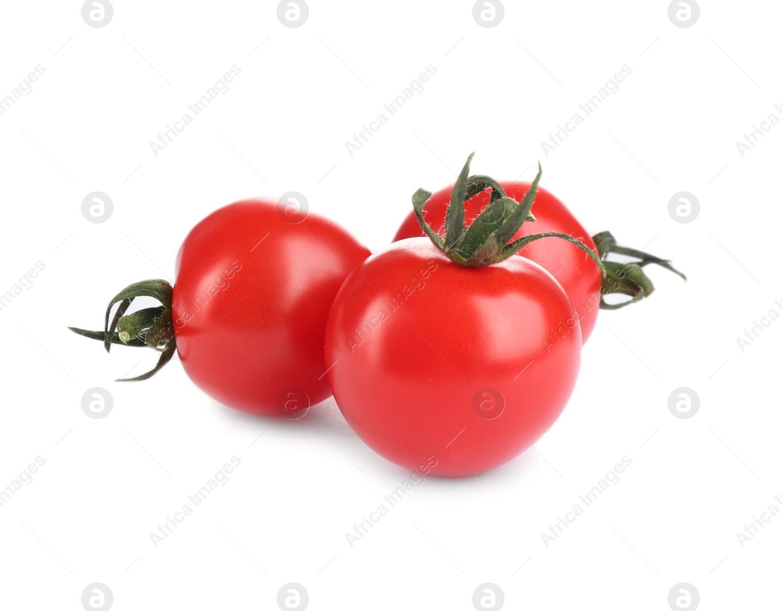 Photo of Fresh ripe organic tomatoes isolated on white