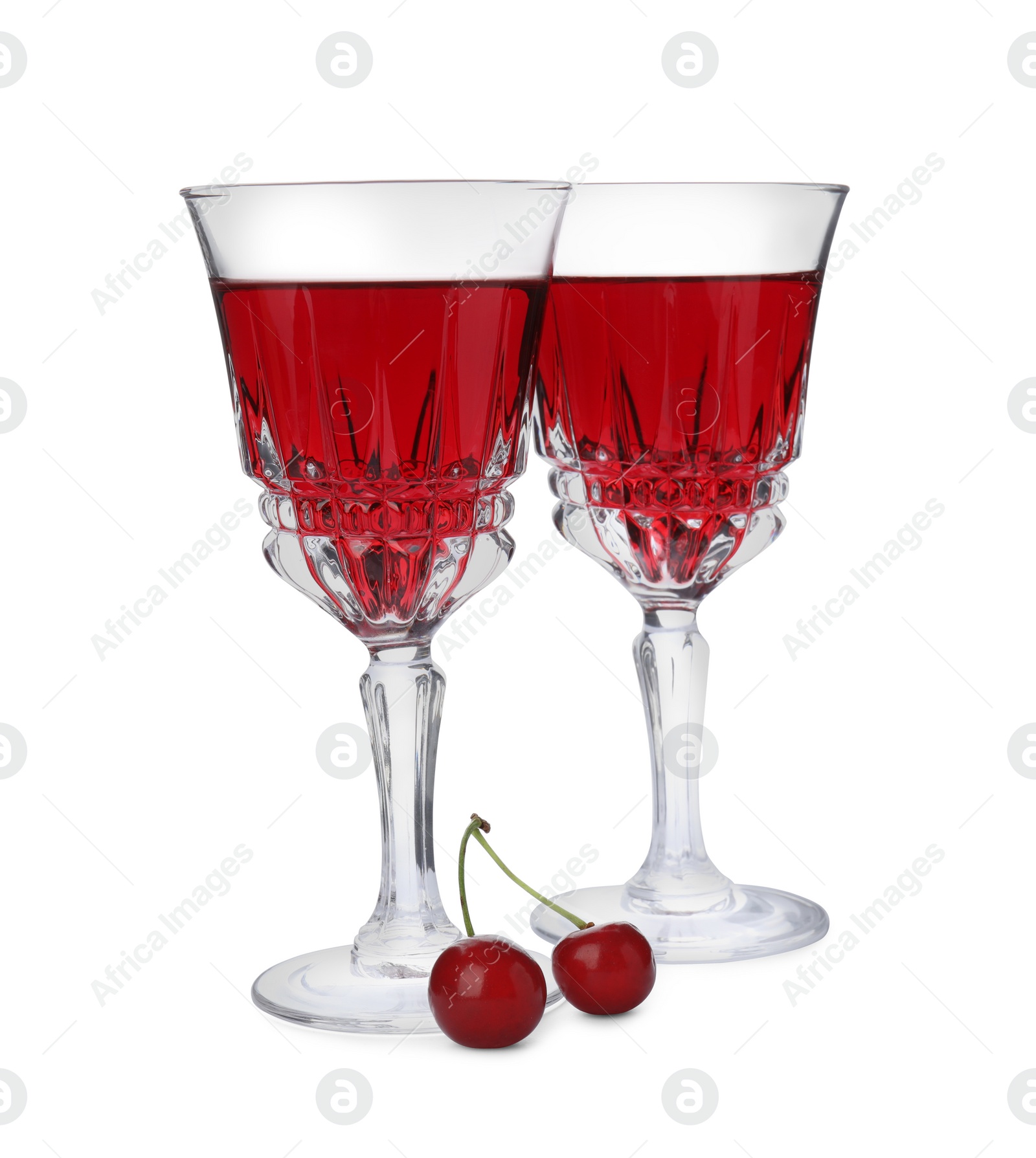 Photo of Delicious cherry wine with ripe juicy berries isolated on white