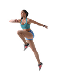 Athletic young woman running on white background