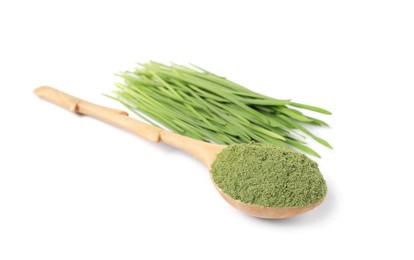 Photo of Wheat grass powder in wooden spoon and fresh sprouts isolated on white