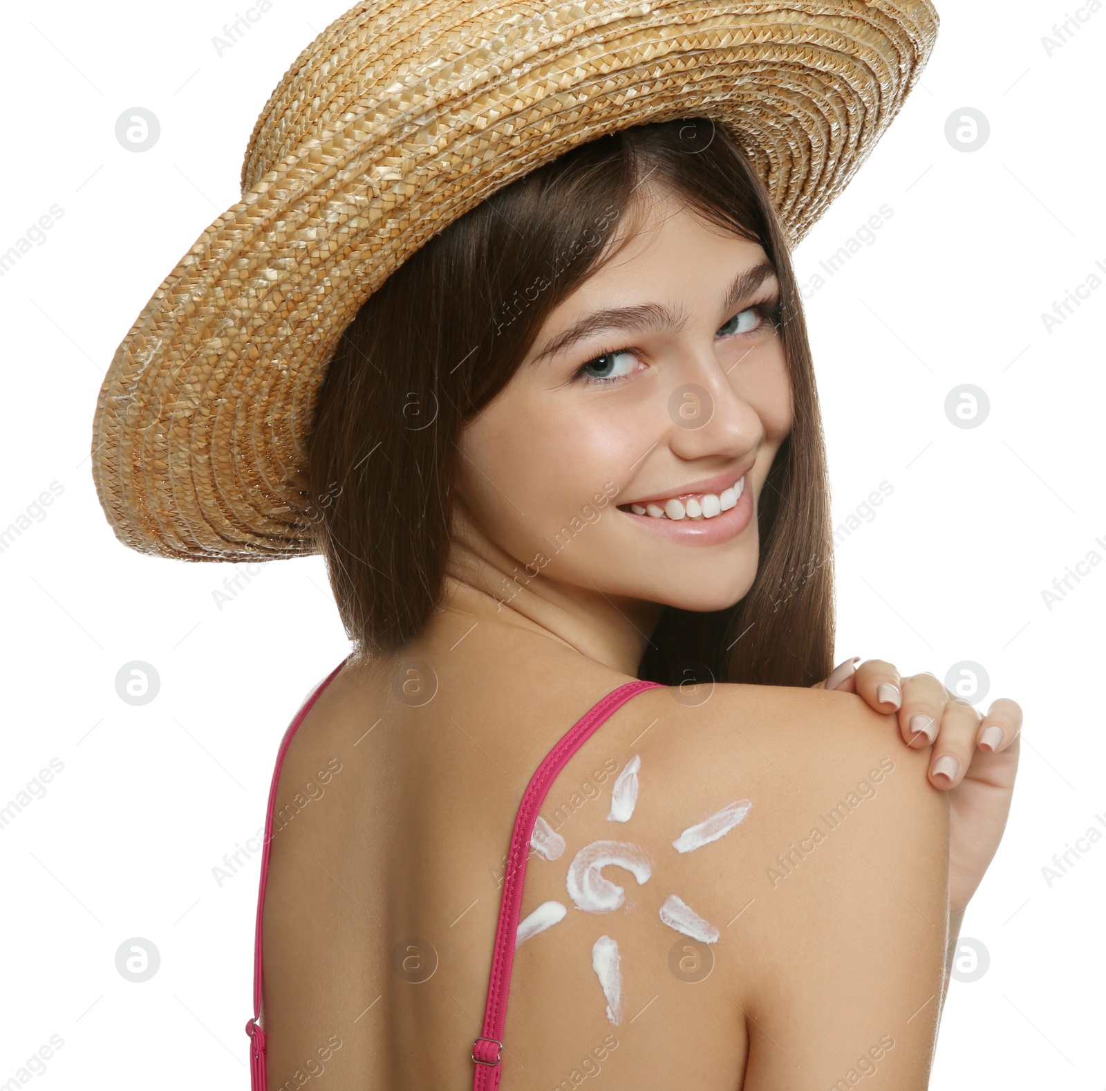 Photo of Teenage girl with sun protection cream on her back against white background