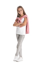 Photo of Pretty preteen girl posing against white background