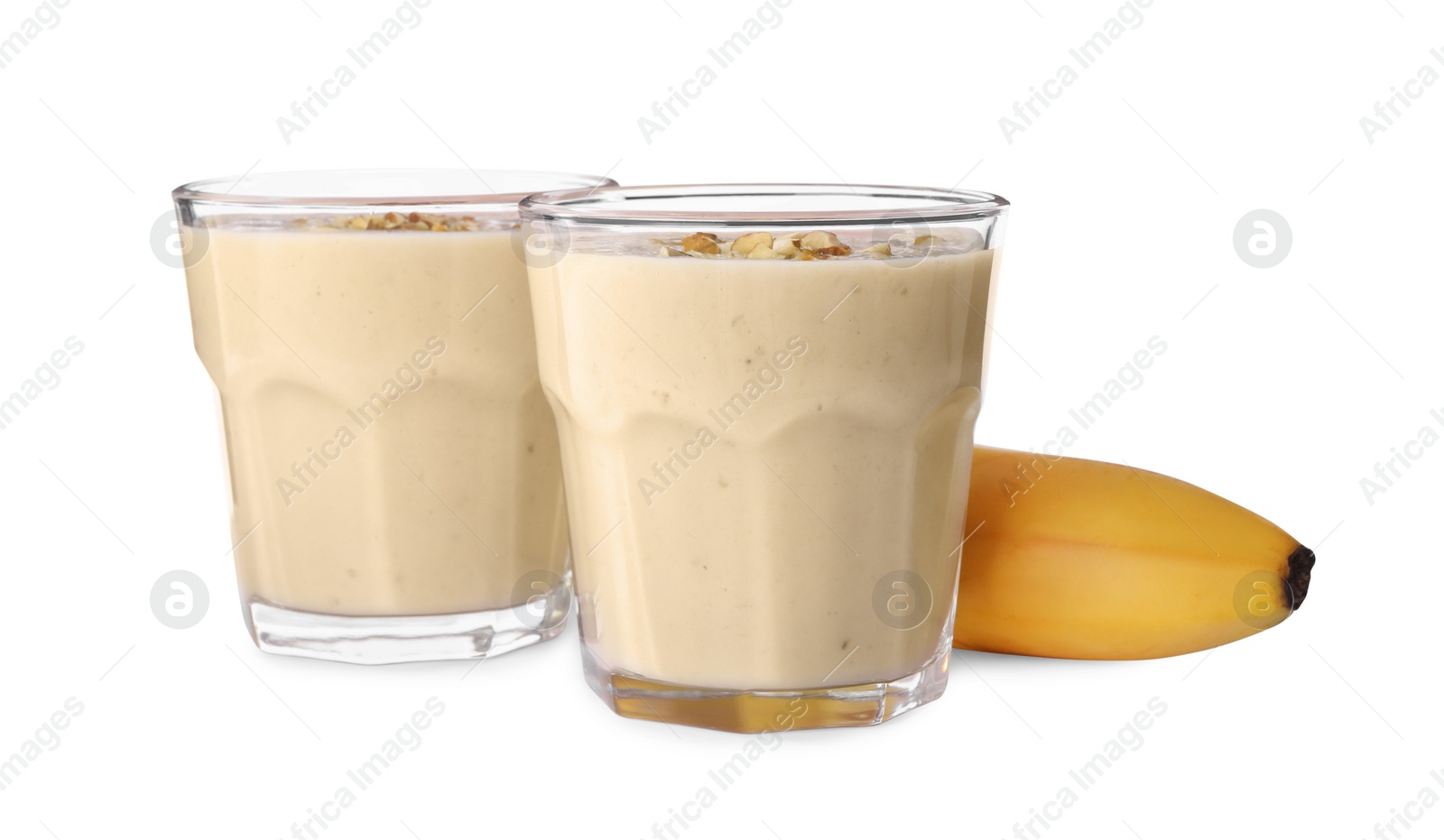 Photo of Tasty banana smoothie with almond and fresh fruit on white background