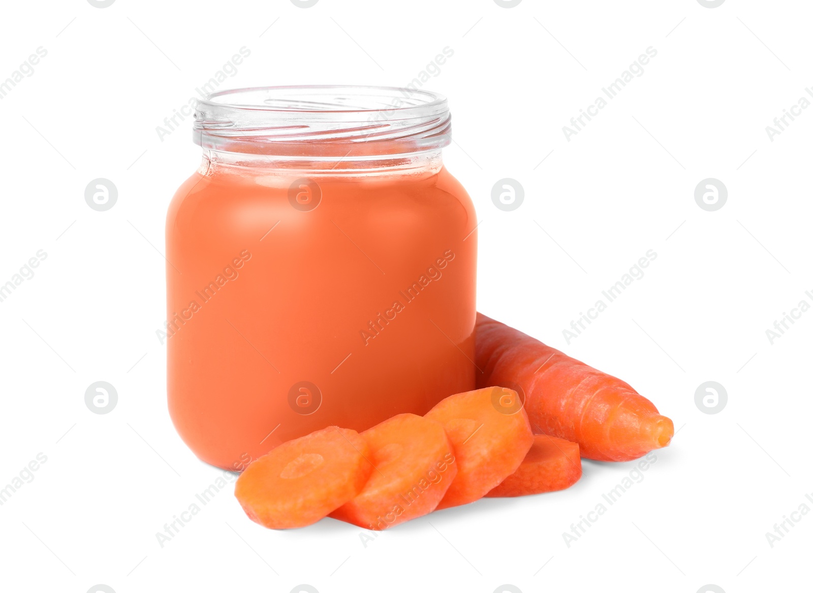 Photo of Jar of healthy baby food and carrot slices on white background