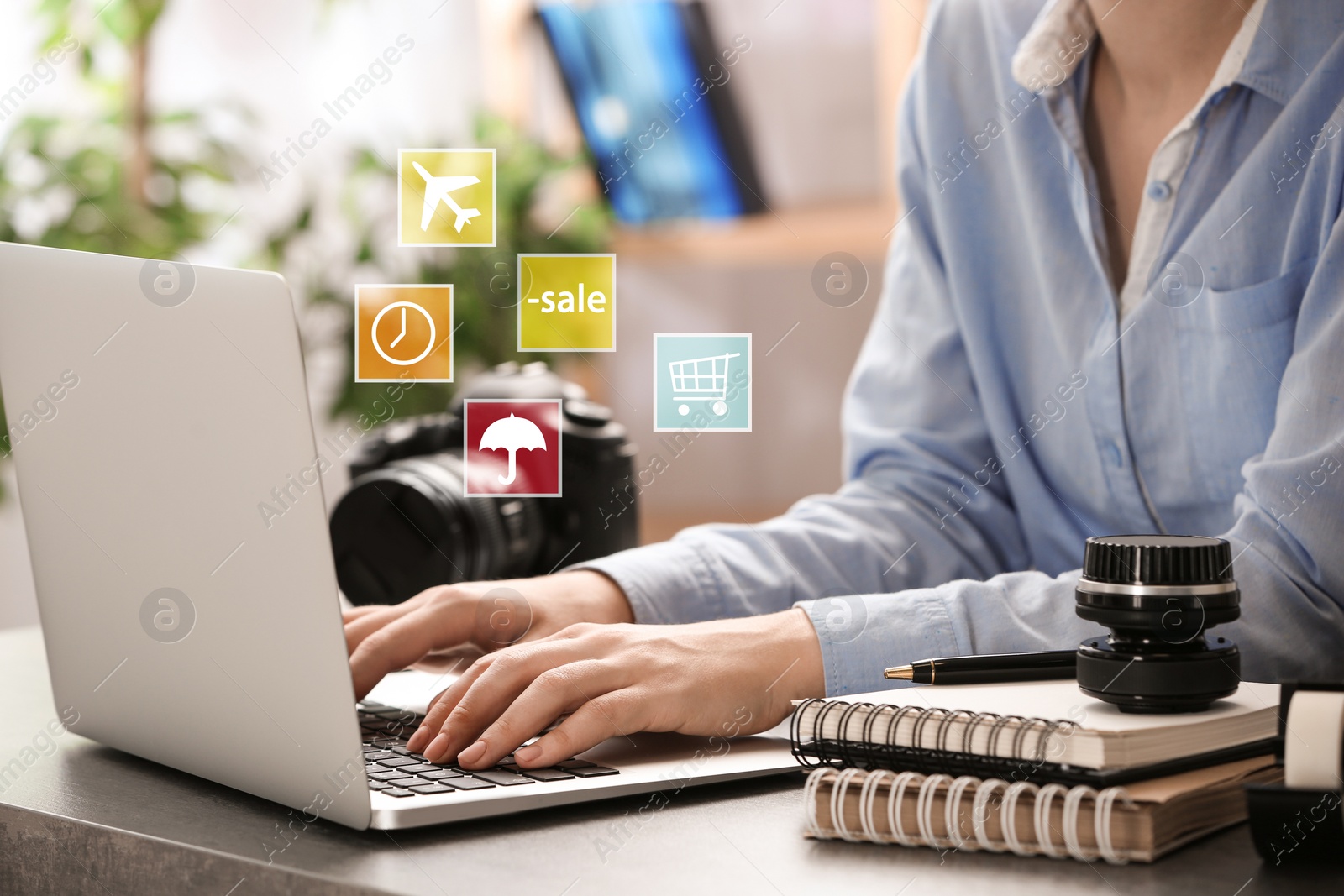 Image of Woman using laptop at table indoors, closeup. Online shopping