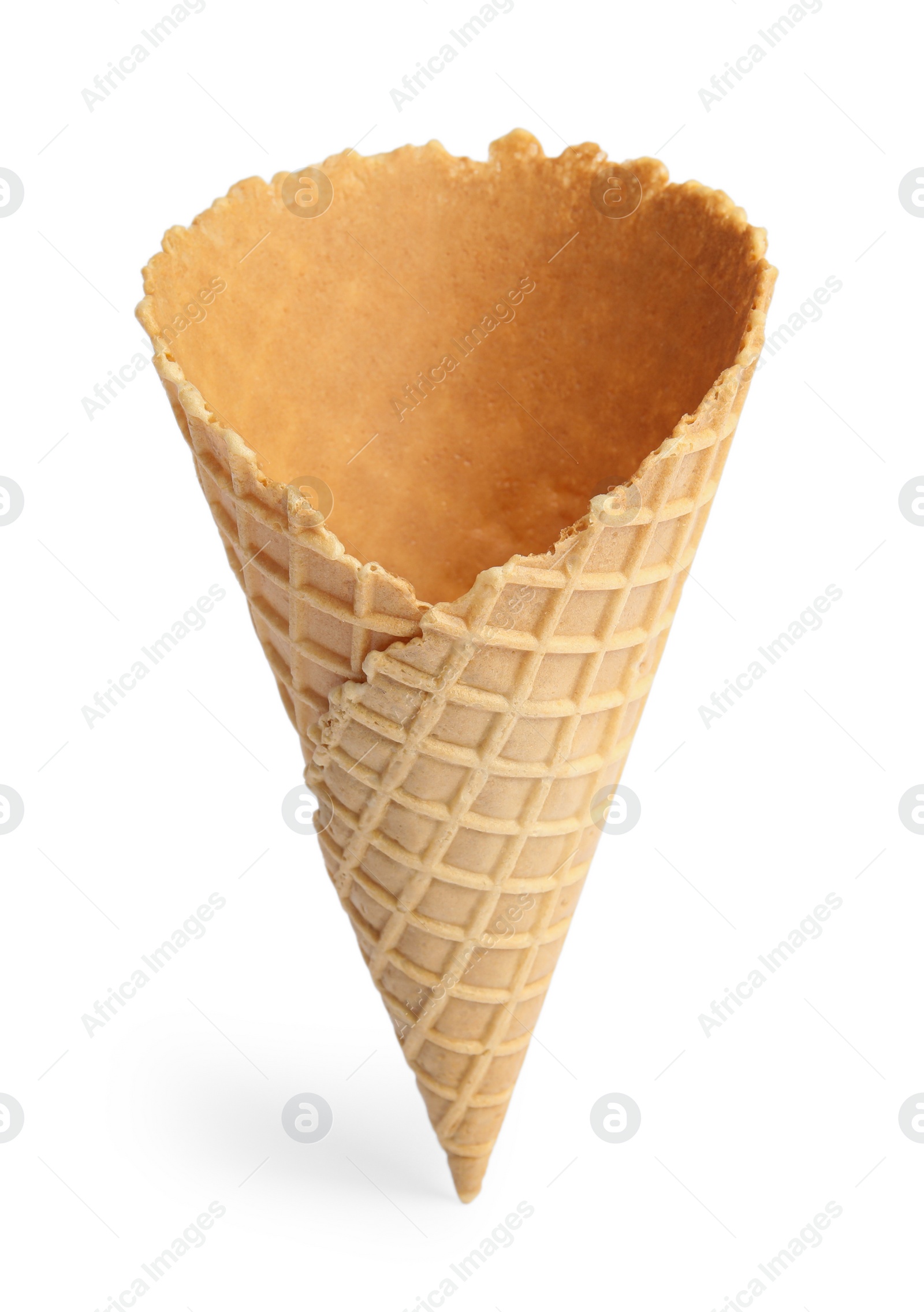 Photo of Empty wafer ice cream cone on white background