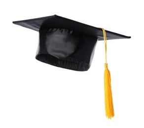 Photo of Graduation hat with gold tassel isolated on white