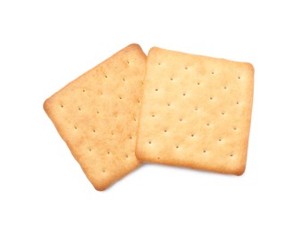 Two crispy crackers isolated on white, top view. Delicious snack