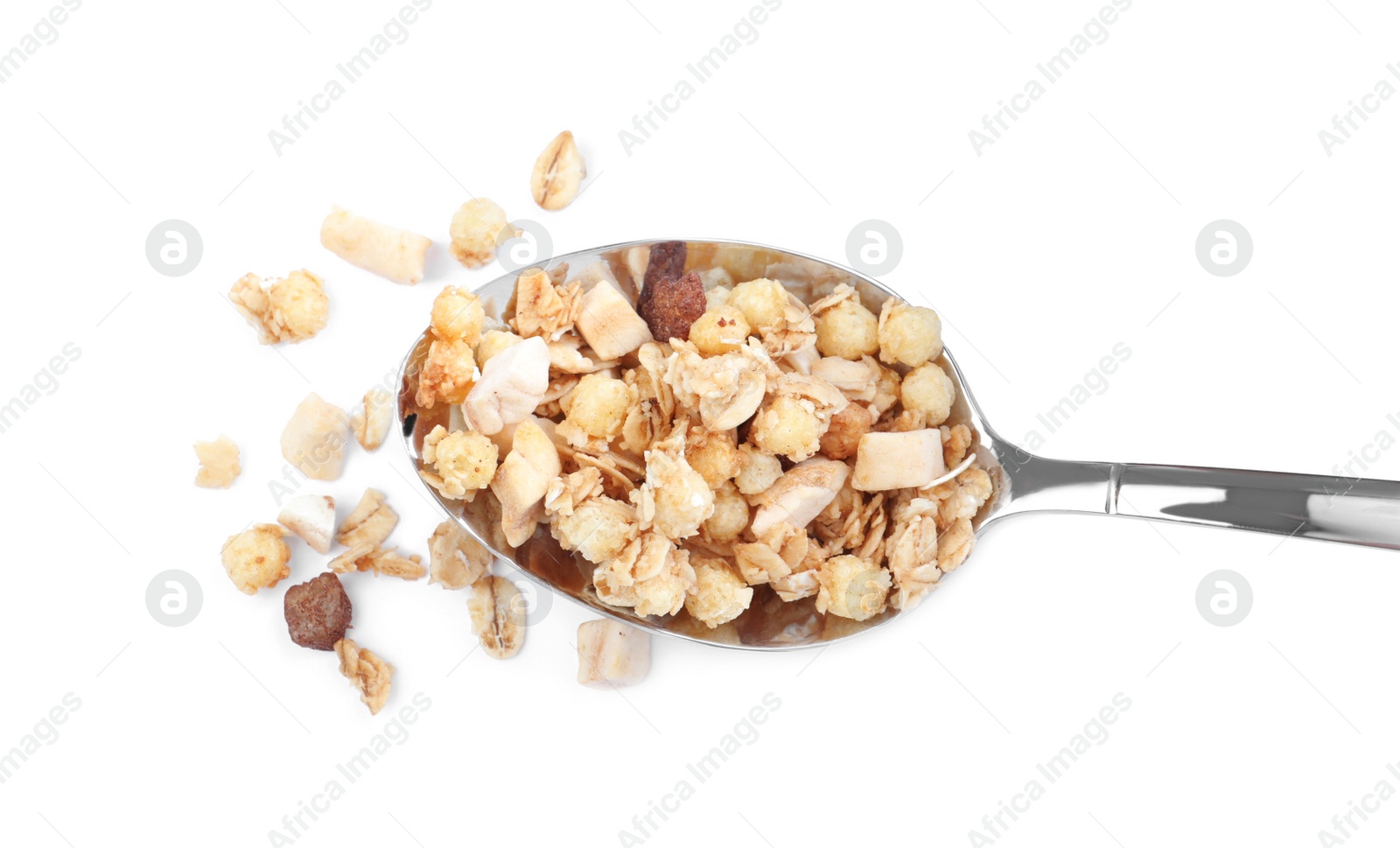 Photo of Spoon with granola on white background, top view. Healthy snack