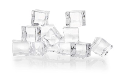 Photo of Many melting crystal clear ice cubes isolated on white