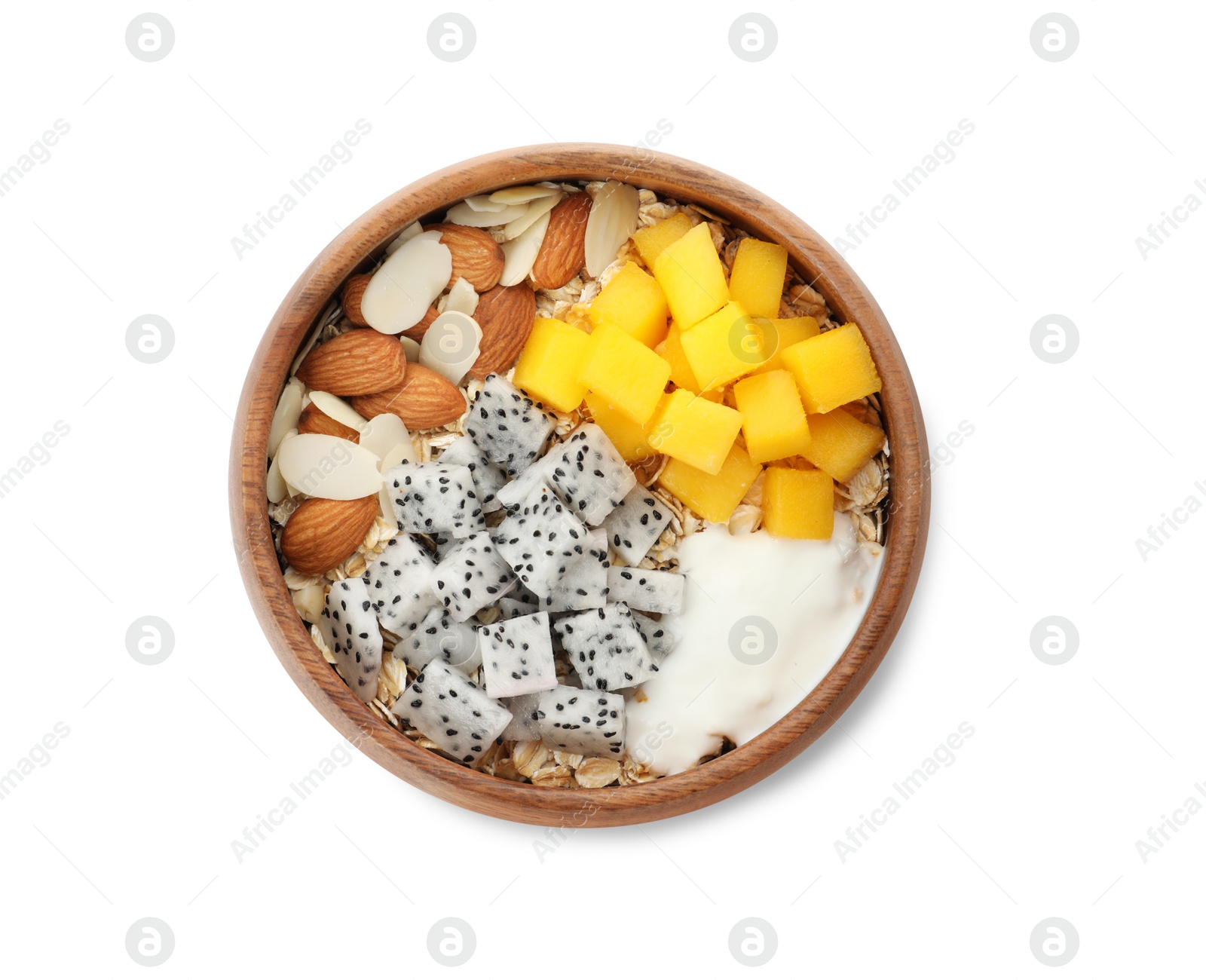 Photo of Bowl of granola with pitahaya, mango, almonds and yogurt isolated on white, top view