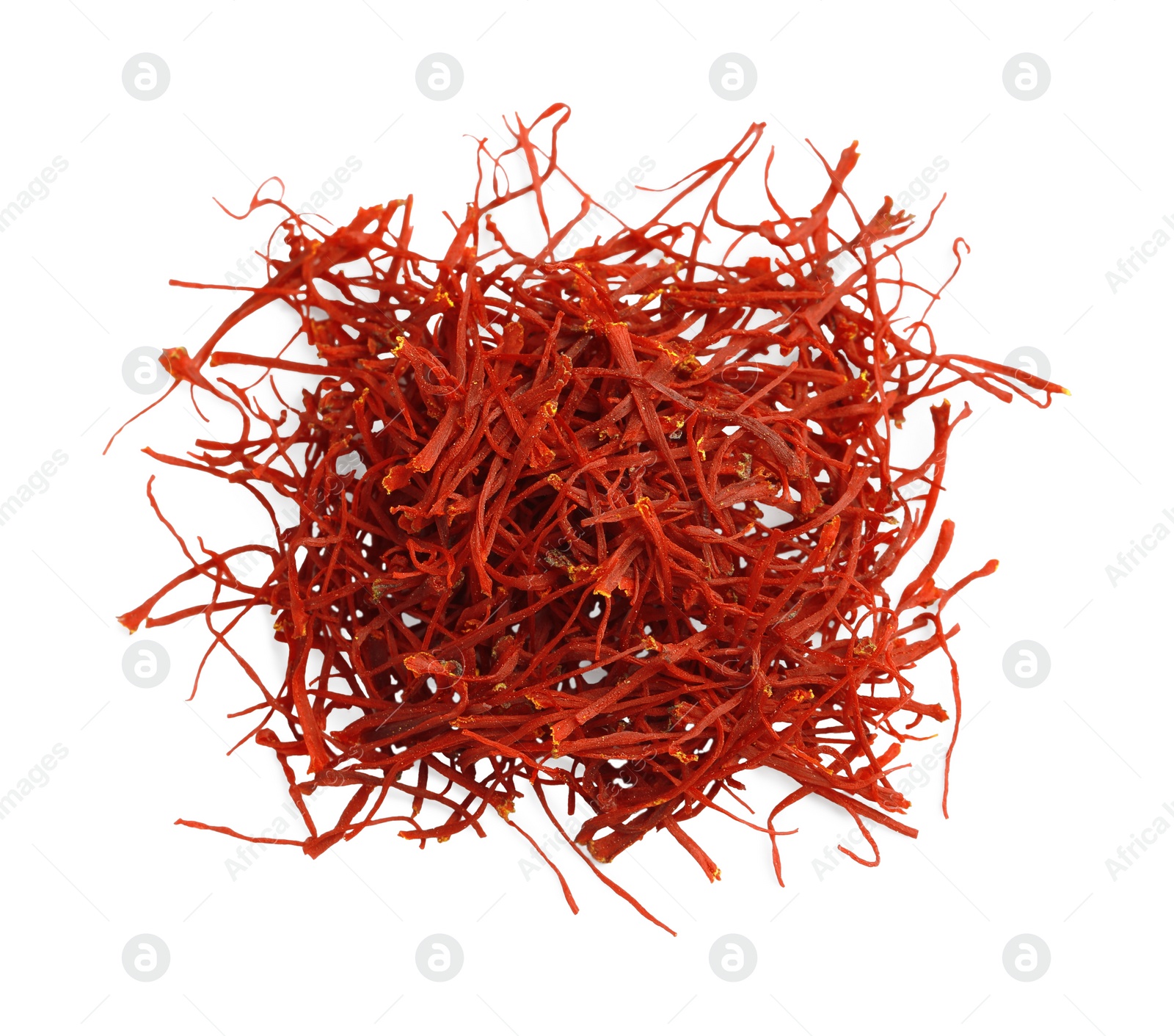 Photo of Pile of dried red saffron isolated on white, top view