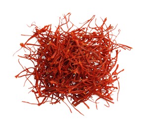 Photo of Pile of dried red saffron isolated on white, top view