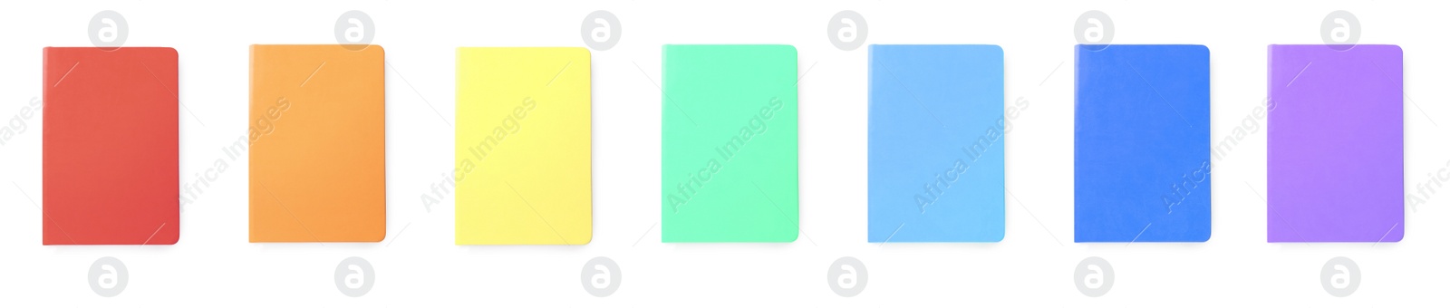 Image of Set with multicolor notebooks on white background, top view. Banner design