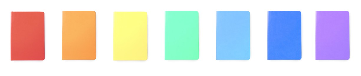 Image of Set with multicolor notebooks on white background, top view. Banner design