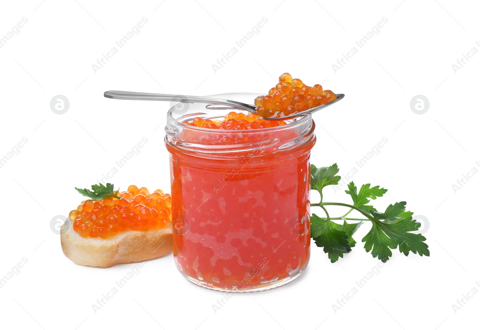 Photo of Delicious red caviar, tasty sandwich and parsley on white background