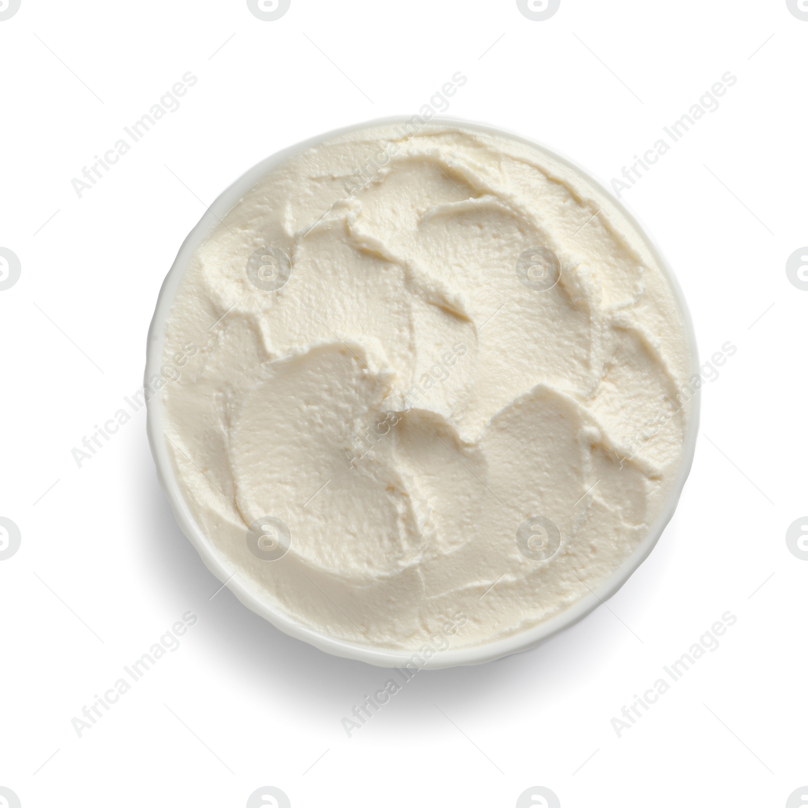 Photo of Bowl of tasty cream cheese on white background, top view