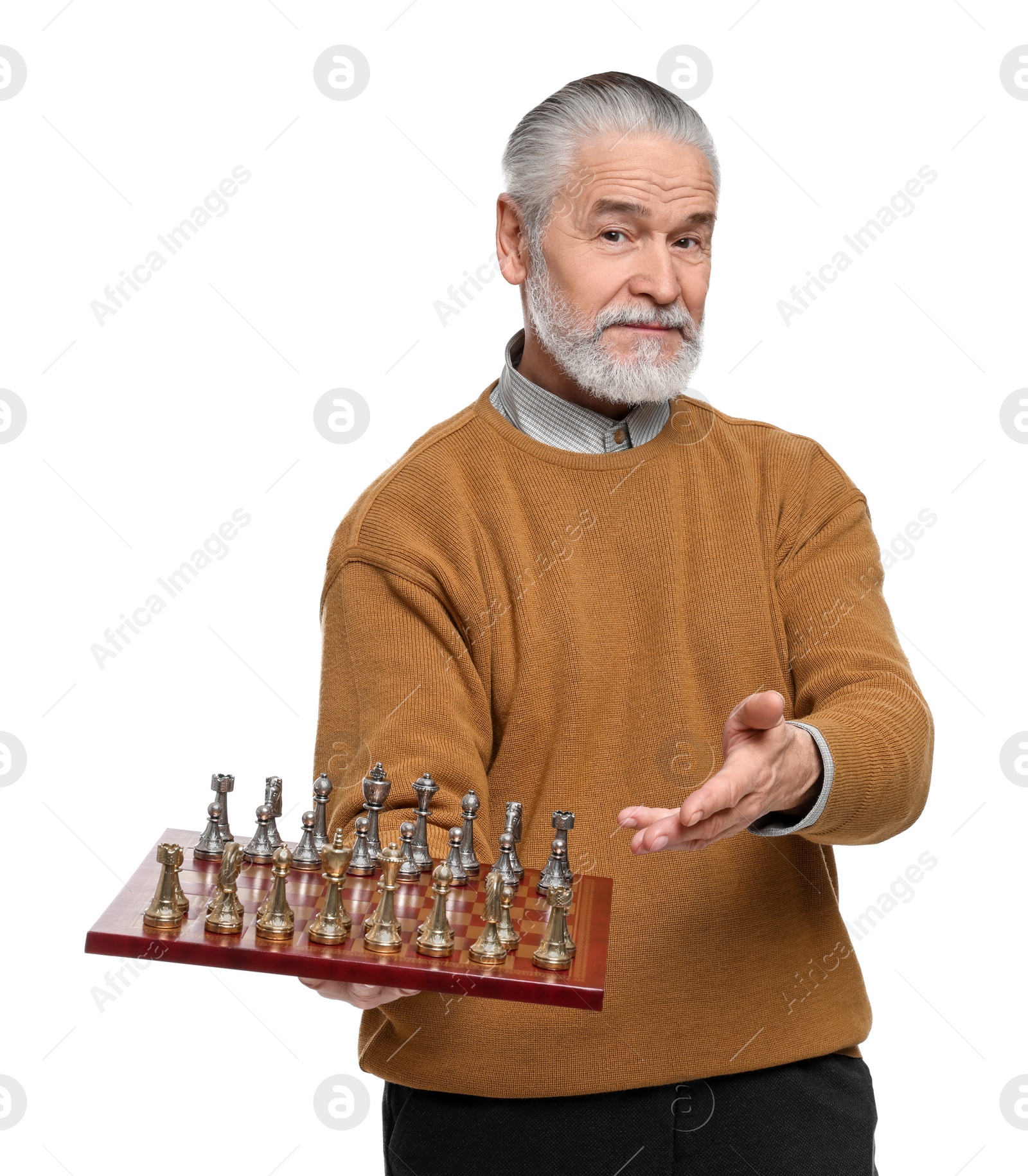 Photo of Man showing chessboard and game pieces on white background