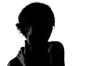 Image of Silhouette of woman posing on white background