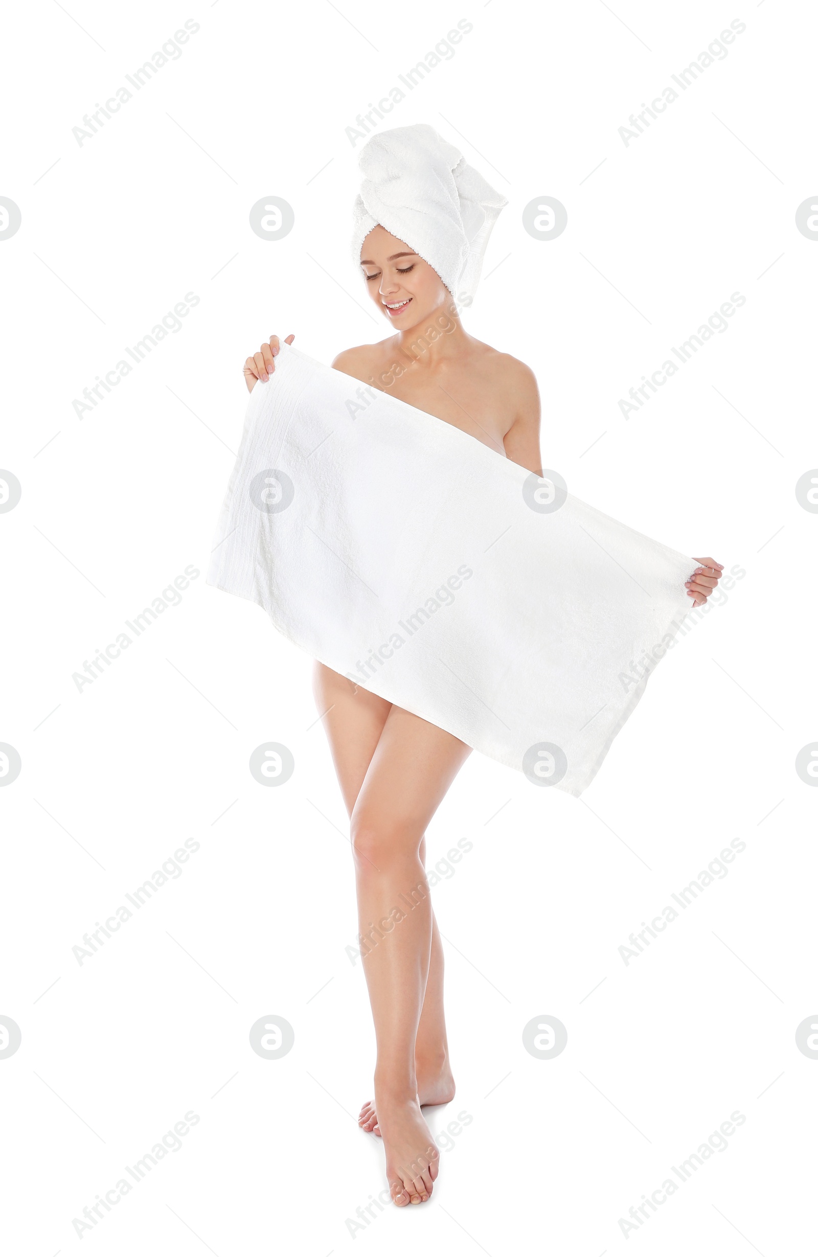 Photo of Full length portrait of young pretty woman with towels on white background